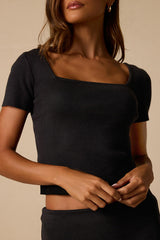 Dalida Black Ribbed Knit Short Sleeve Top