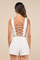 Exceptionally Styled Ivory Lace-Up Two-Piece Skort Romper