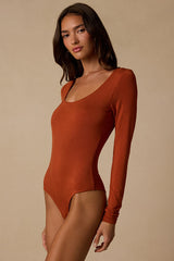 Easily Loved Rust Long Sleeve Bodysuit