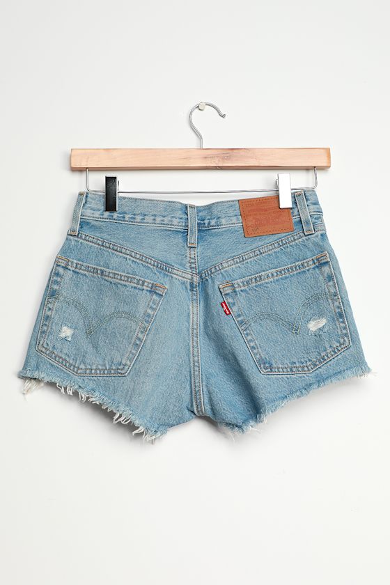501 Mid Rise Distressed Light Wash Denim Cutoff Shorts