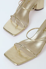Jocelynn Gold Strappy High Heel Sandals